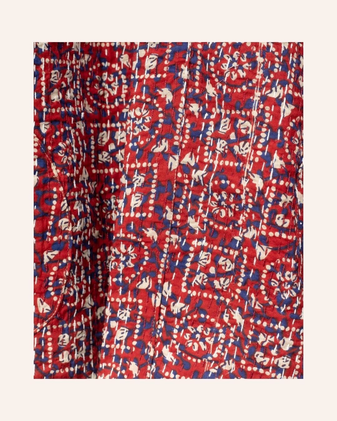 Handcrafted red kimono jacket with traditional Bagru block print and Kantha stitch details in natural cotton.