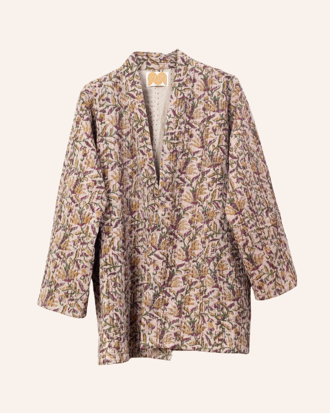 Handcrafted Bagru print kimono in earthy tones with kantha stitch detail, perfect for layered looks.