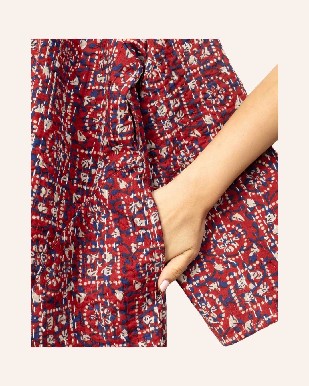Handcrafted red kimono jacket with traditional Bagru block print and Kantha stitch details in natural cotton.
