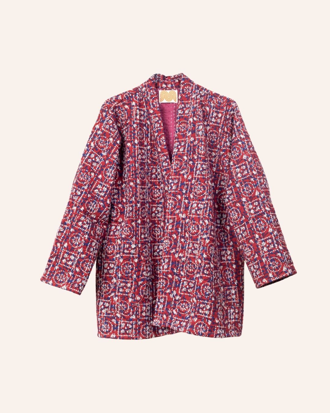Handcrafted red kimono jacket with traditional Bagru block print and Kantha stitch details in natural cotton.