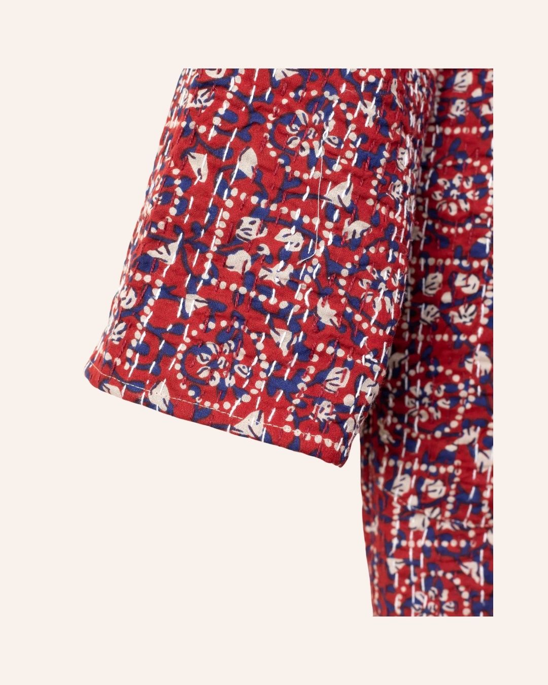 Handcrafted red kimono jacket with traditional Bagru block print and Kantha stitch details in natural cotton.