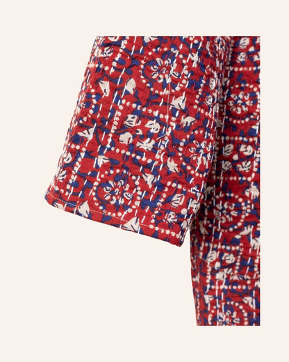 Handcrafted red kimono jacket with traditional Bagru block print and Kantha stitch details in natural cotton.