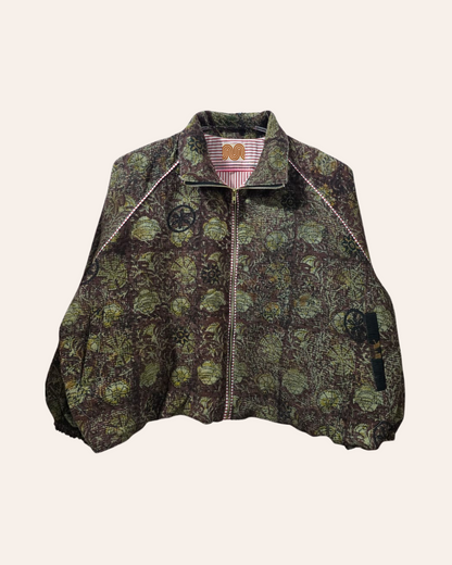 Green and brown floral bomber jacket with artisan stitch detailing